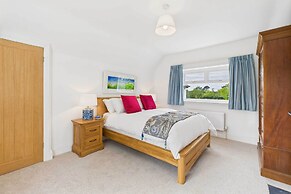 Host Stay Merrow Cottage