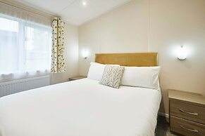 Host Stay Woodpecker Lodge