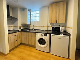 Apartamentos Escarrilla Suites 3000