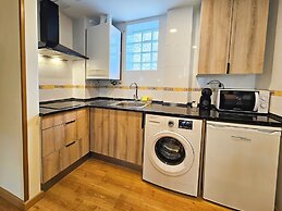 Apartamentos Escarrilla Suites 3000