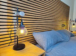 Apartamentos Escarrilla Suites 3000