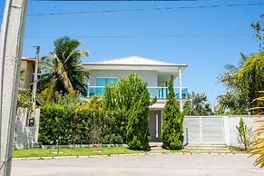 Casa com Piscina Quadra de Areia e Churrasqueira