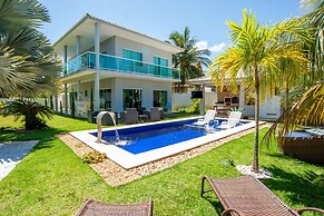 Casa com Piscina Quadra de Areia e Churrasqueira