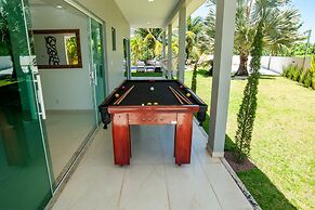 Casa com Piscina Quadra de Areia e Churrasqueira