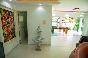 Casa com Piscina Quadra de Areia e Churrasqueira