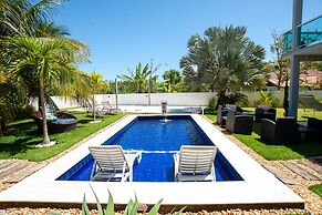 Casa com Piscina Quadra de Areia e Churrasqueira