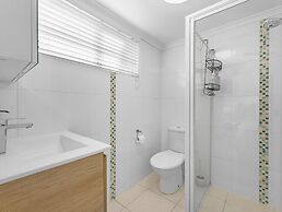 Bright Coastal Stay With Pool and Beach View