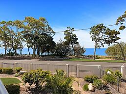 Bright Coastal Stay With Pool and Beach View