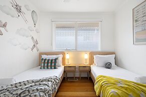 Relaxed Bayside Stay With Outdoor Space