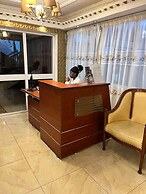 Appart'hôtel Micheline Suites Bastos
