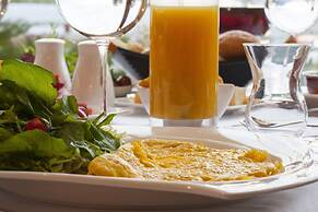 Appart'hôtel Micheline Suites Bastos