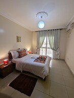 Appart'hôtel Micheline Suites Bastos