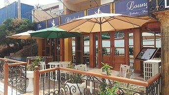 Appart'hôtel Micheline Suites Bastos