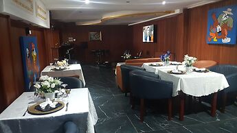 Appart'hôtel Micheline Suites Bastos