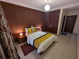 Appart'hôtel Micheline Suites Bastos