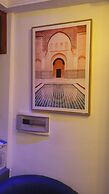 Appart'hôtel Micheline Suites Bastos