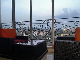Appart'hôtel Micheline Suites Bastos