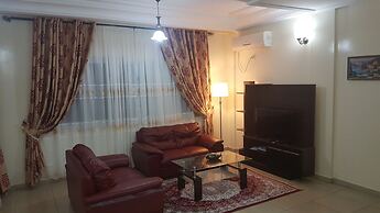 Appart'hôtel Micheline Suites Bastos