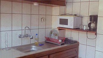 Appart'hôtel Micheline Suites Bastos