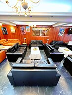 Appart'hôtel Micheline Suites Bastos
