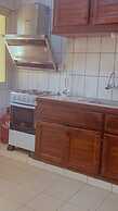 Appart'hôtel Micheline Suites Bastos