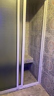 Appart'hôtel Micheline Suites Bastos