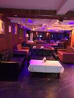 Appart'hôtel Micheline Suites Bastos