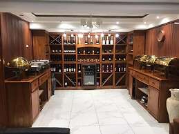 Appart'hôtel Micheline Suites Bastos