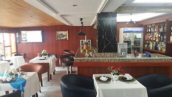 Appart'hôtel Micheline Suites Bastos