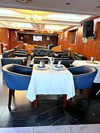 Appart'hôtel Micheline Suites Bastos