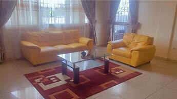Appart'hôtel Micheline Suites Bastos