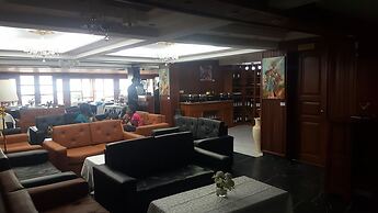 Appart'hôtel Micheline Suites Bastos