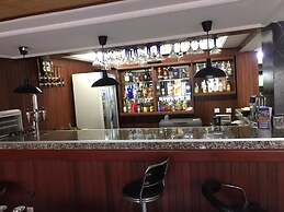Appart'hôtel Micheline Suites Bastos