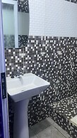 Appart'hôtel Micheline Suites Bastos