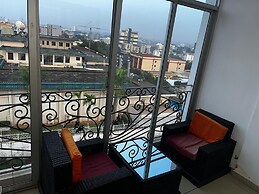Appart'hôtel Micheline Suites Bastos