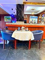 Appart'hôtel Micheline Suites Bastos