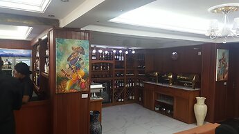Appart'hôtel Micheline Suites Bastos