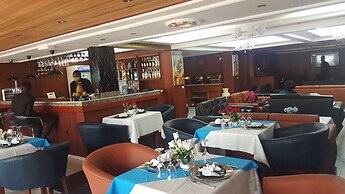 Appart'hôtel Micheline Suites Bastos