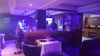 Appart'hôtel Micheline Suites Bastos