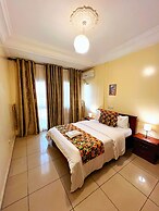 Appart'hôtel Micheline Suites Bastos