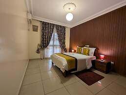 Appart'hôtel Micheline Suites Bastos