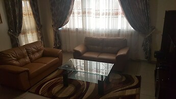 Appart'hôtel Micheline Suites Bastos