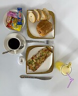 Appart'hôtel Micheline Suites Bastos