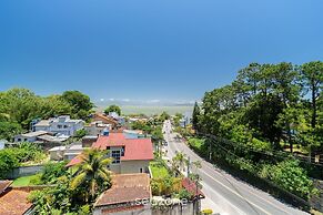 Estúdio premium com varanda e sol da manhã SGR0217