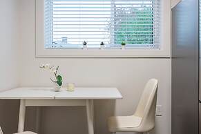 Sunny 1BR Detached Suite