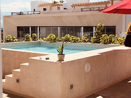 Stylish Studios with Rooftop Pool