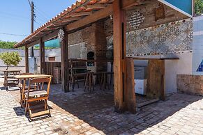 Casa com Piscina Churrasqueira e Garagem
