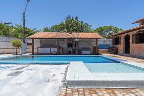 Casa com Piscina Churrasqueira e Garagem