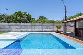 Casa com Piscina Churrasqueira e Garagem