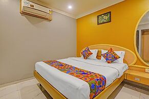 Fabhotel Stay Land Plus